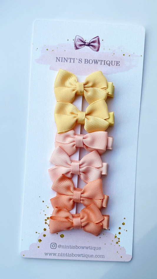 SUNSHINE HAIR BOW CLIPS