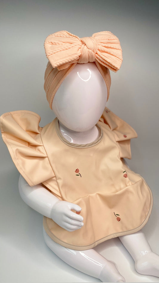 ROSE PEACH FRILL BIB