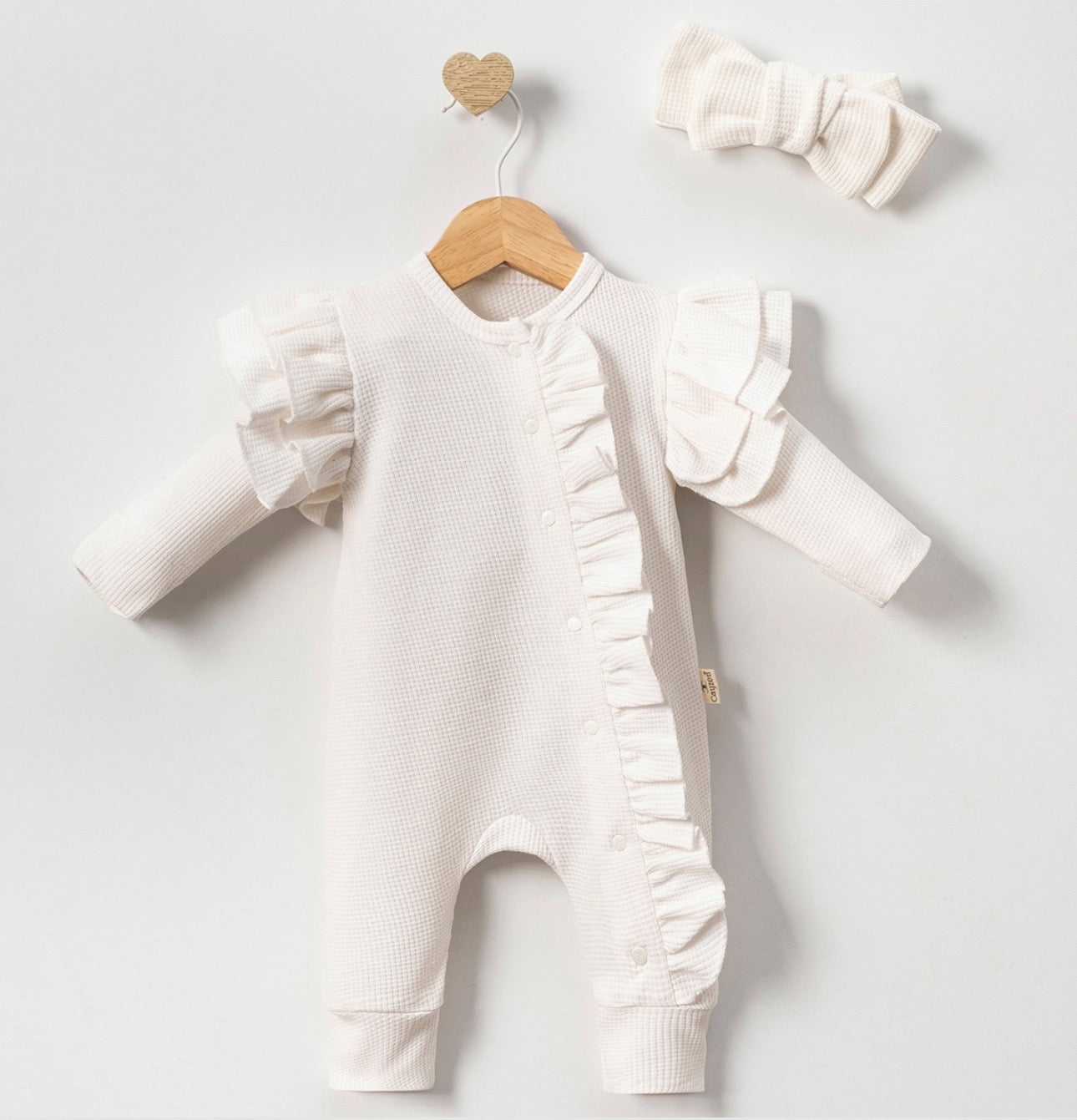 WHITE FRILL SLEEPSUIT WITH MATCHING BOW