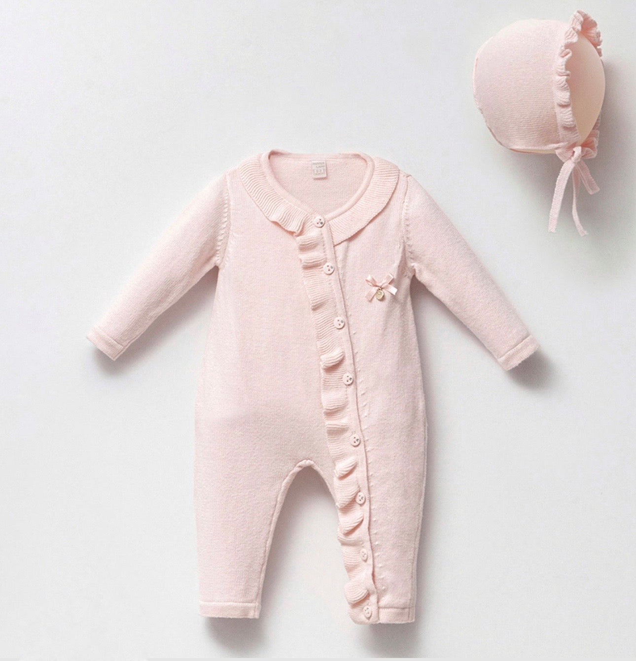 Knitted sleepsuit with bonnet