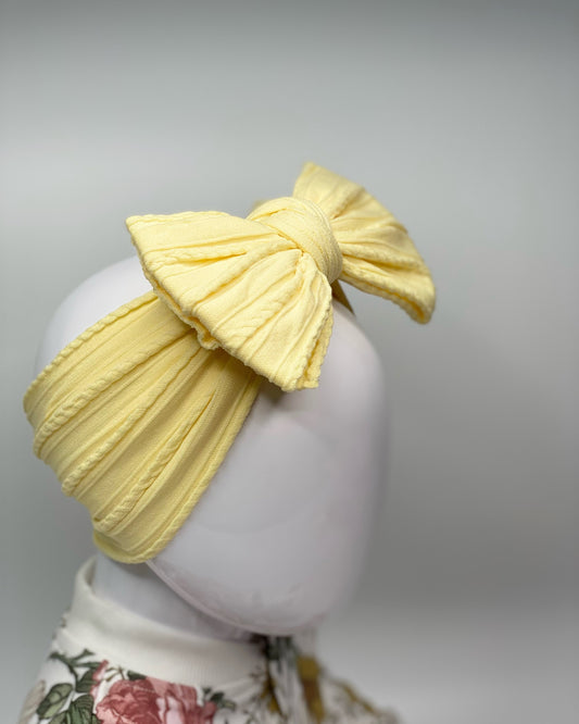 LEMONADE LARGE BOW CABLE KNIT