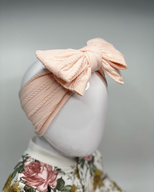 BALLERINA PINK LARGE BOW CABLE KNIT