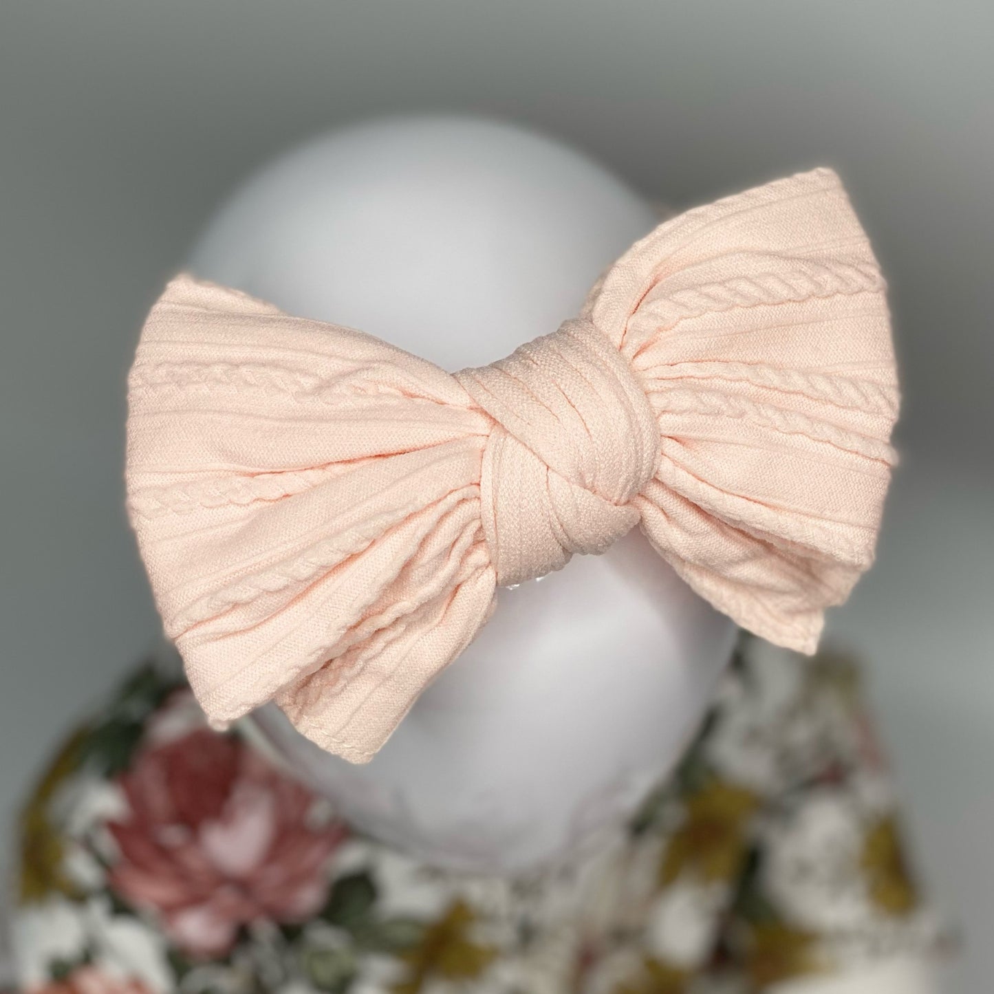 BALLERINA PINK LARGE BOW CABLE KNIT